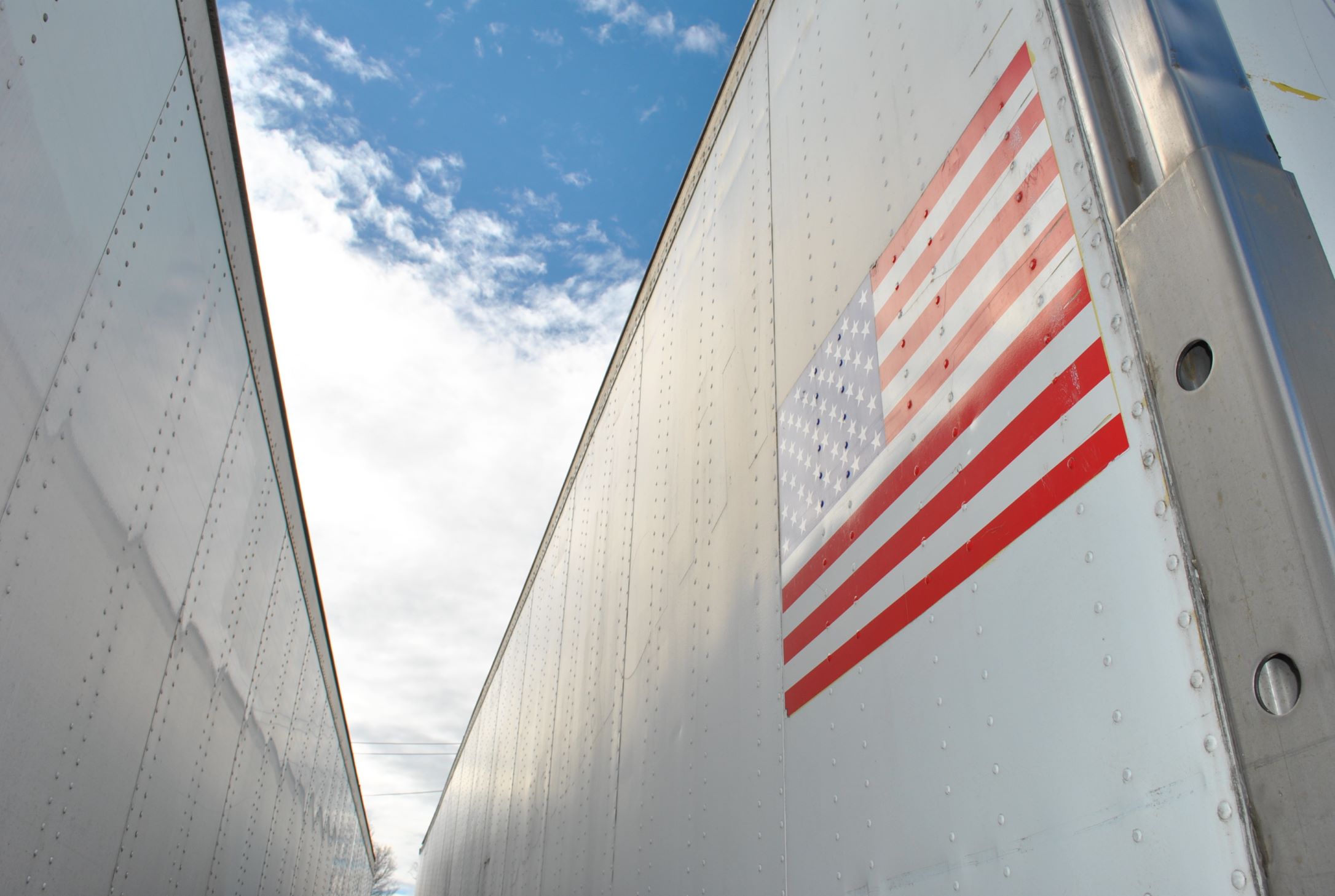 American flag on the side of a truck trailer