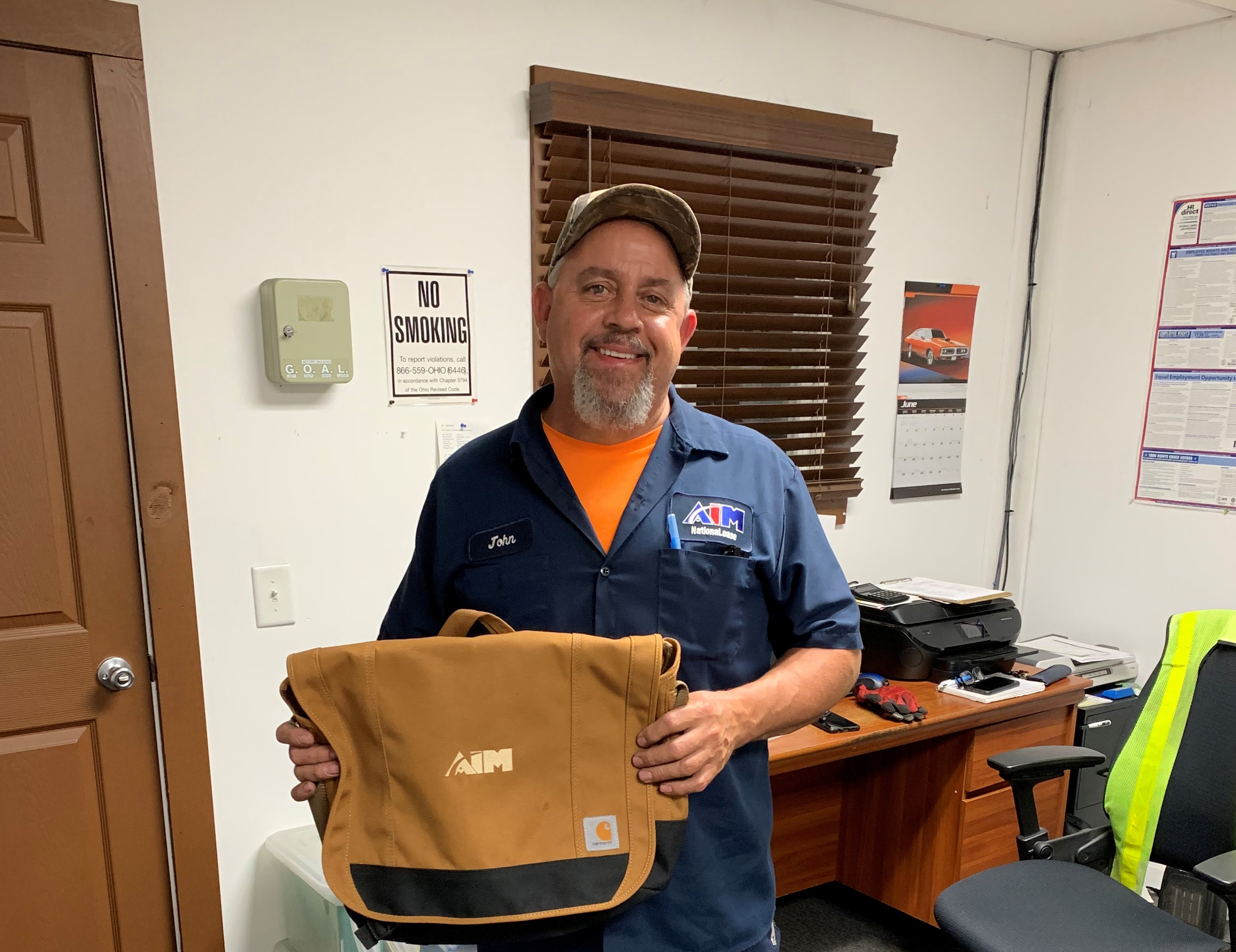 In recognition of his performance, John Hinkle received an Aim Carhartt laptop bag and a gift card.